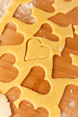 Making self-made christmas star cinnamon cookie, closeup, low focus