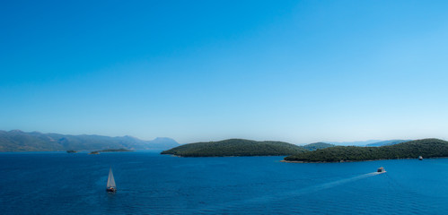 Sea panorama view with sailing and motor boat