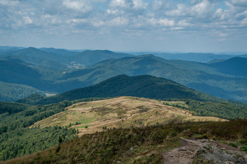 Fototapeta premium Mountain view, cloudy weather, interesting hills in the background