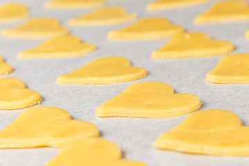 Making self-made christmas star cinnamon cookie, closeup, low focus