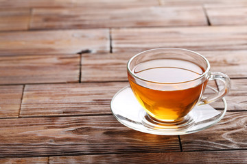Cup of tea on brown wooden table