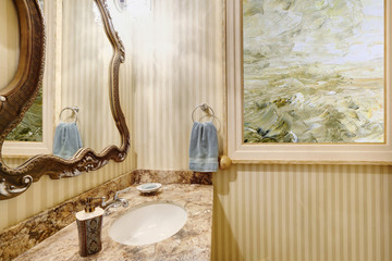 Close up of bathroom vanity with marble top