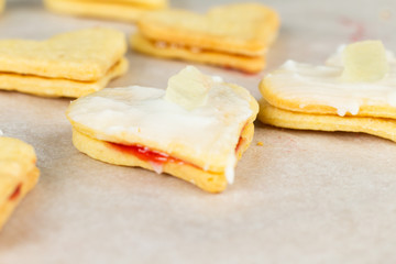 Making self-made christmas star cinnamon cookie, closeup, low focus