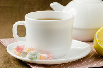 Turkish delight with tea on a saucer