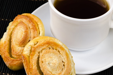 cup of hot black tea, lemon, homemade cookies