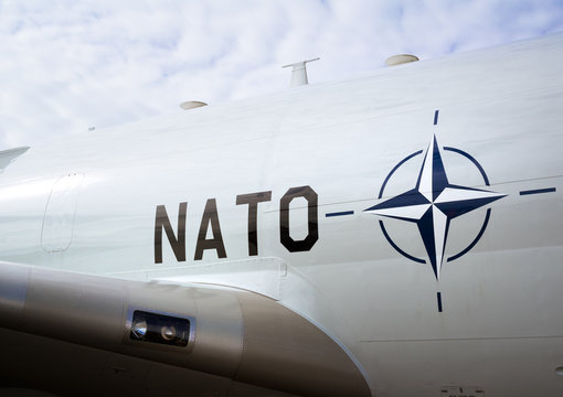 NATO DAYS, OSTRAVA, CZECH REP - SEPTEMBER 18, 2016: Symbol of NATO ( North Atlantic Treaty Organization ) on the side of fuselage of big gray airplane