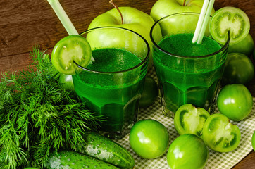 green smoothies with fresh vegetables and fruits