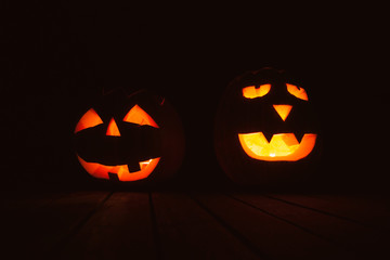 Halloween pumpkin lanterns with evil faces