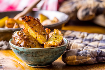 Potato. Roasted potatoes. American potatoes with salt pepper and cumin. Roasted potato wedges delicious crispy.