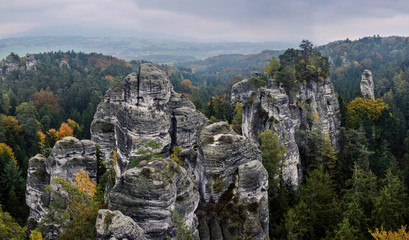 Fototapeta na wymiar Rocky landscape during the autumn with the colourful trees, Bohemian Paradise, Czech Republic
