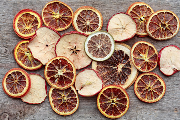 Dried fruits for festive decoration on wooden table