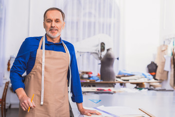 Senior man working in workshop