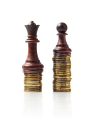 Image of chess pieces standing on stacks of coins isolated on wh