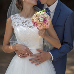 Torso and hands of unrecognizable married couple