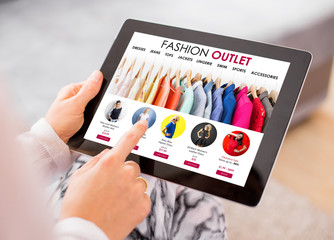 Fashion outlet website on tablet