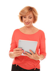 Portrait of senior woman with tablet computer, isolated on white