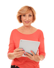 Portrait of senior woman with tablet computer, isolated on white