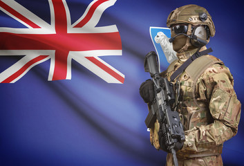 Soldier in helmet holding machine gun with flag on background series - Falkland Islands
