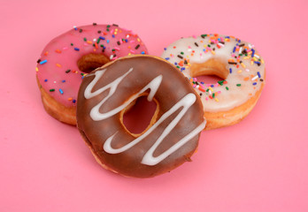 Donuts on Pink Background with copy space for text