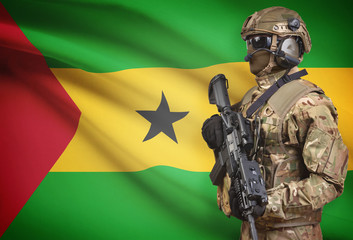 Soldier in helmet holding machine gun with flag on background series - Sao Tome and Principe