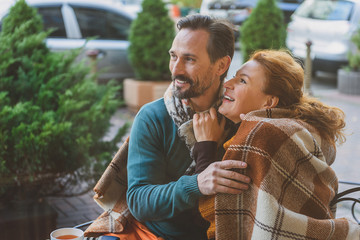 Cheerful man and woman expressing their love