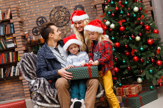 Happy Family On Soft Chair