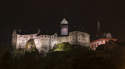 Fototapeta na wymiar Loket castle in dark night