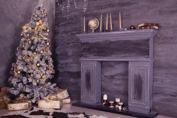 Christmas Interior decoration with Christmas boxes, fireplace an