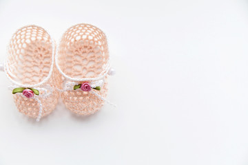 Pink Baby booties isolated on a white background, baby booties