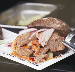 Street food burger with bacon, meat, vegetables and mayonnaise S