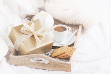 Fototapeta na wymiar Romantic breakfast with coffee, cookies and gift box, birthday,