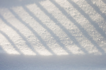 Snow texture with shadows - stripes from a fence