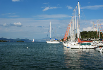 Fototapeta na wymiar Harbour with the white yachts.