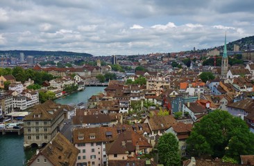 Fototapeta na wymiar A landscape view of Zurich on the Limmat River and the Lake Zurich