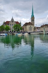 Fototapeta na wymiar A landscape view of Zurich on the Limmat River and the Lake Zurich