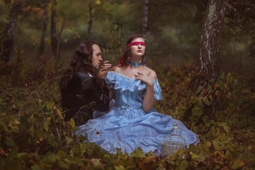 Fototapeta premium Man kisses a hand to the girl.