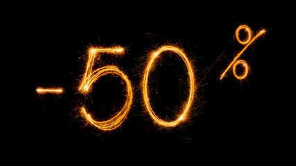  Sale 50 % off  - made with sparklers on black background.