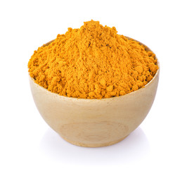 turmeric in wood bowl on white background