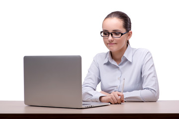 Businesswoman working at her desk on white background