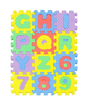 Alphabet and number jigsaw set isolated on white background.