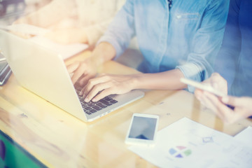 Business team working on laptop, while sitting at office. Busine