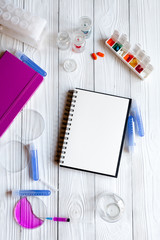 medical student working place at wooden table top view