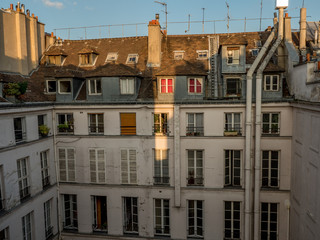 Fototapeta na wymiar apartment rear window sunset, Paris, France
