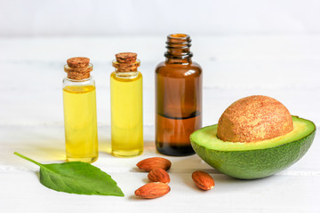 avocado oil for handmade cosmetics on wooden background
