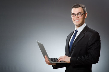 Man with laptop in business concept