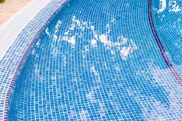 Aqua water in minimalism swimming pool on sunny summer day. - 126887771
