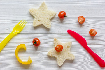 cooking breakfast for kid star sandwiches top view