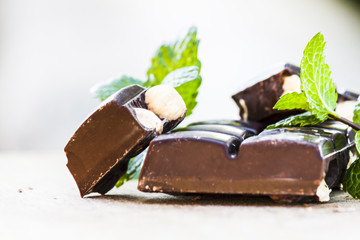 Chocolate with nuts and fresh mint