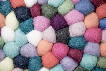 Colorful balls of wool. Colorful felt balls. Dried balls of wool. Colored beads. Felt handmade....