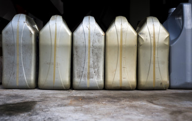 Plastic canister with blank label in a blurred background